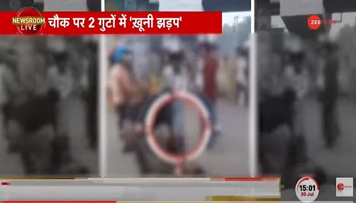 Two groups fight with sticks on a street in Moga in Punjab