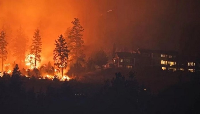 British Columbian authorities ordered residents to evacuate amid Canada wildfires