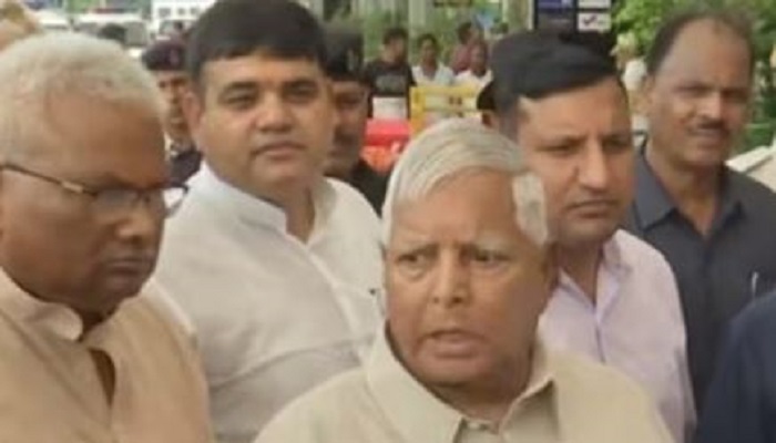 Out on bail RJD Chief Lalu Prasad Yadav says he is going to Mumbai to grab PM Narendra Modi by the neck